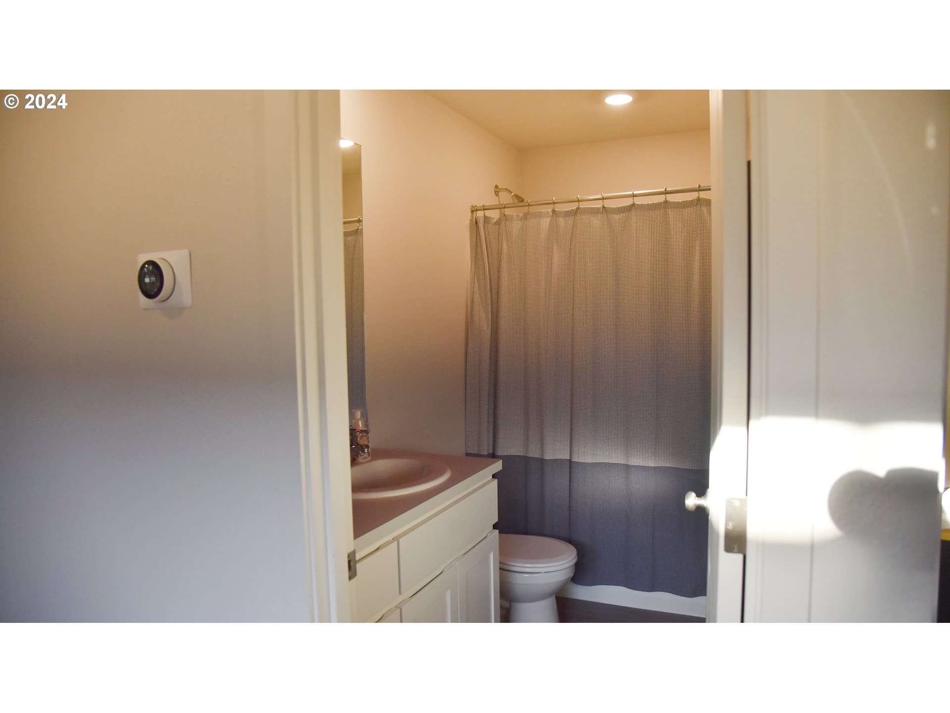 2991 W Street Springfield, OR 97477 - Photo 18 of 43 a bathroom with a sink and a toilet