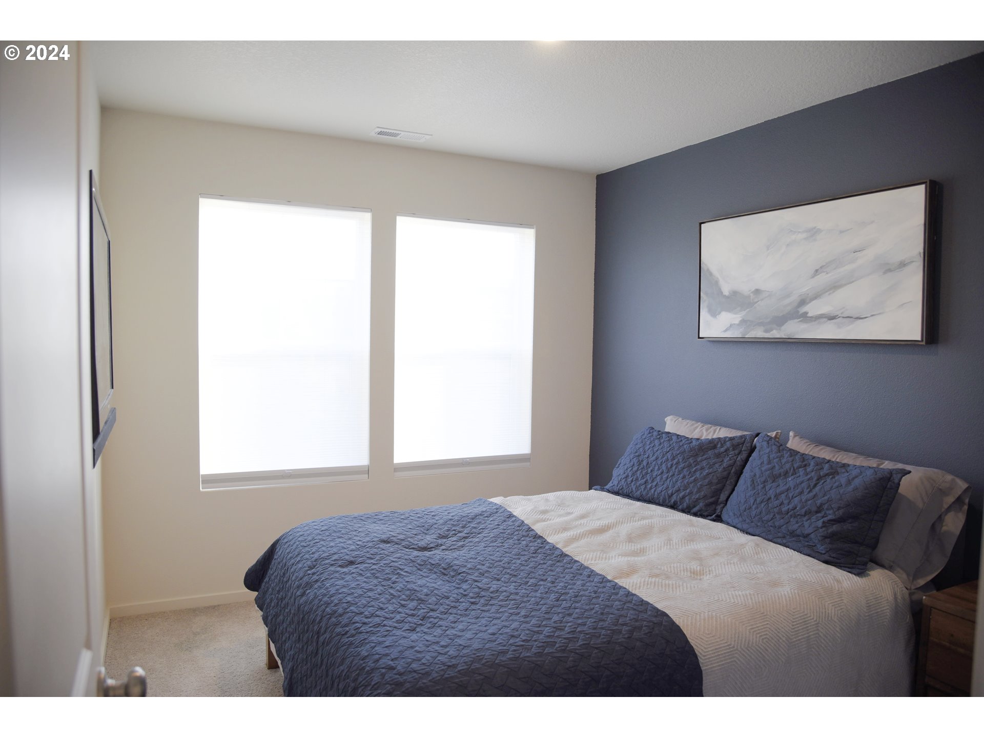 2991 W Street Springfield, OR 97477 - Photo 23 of 43 a bedroom with a bed and a window