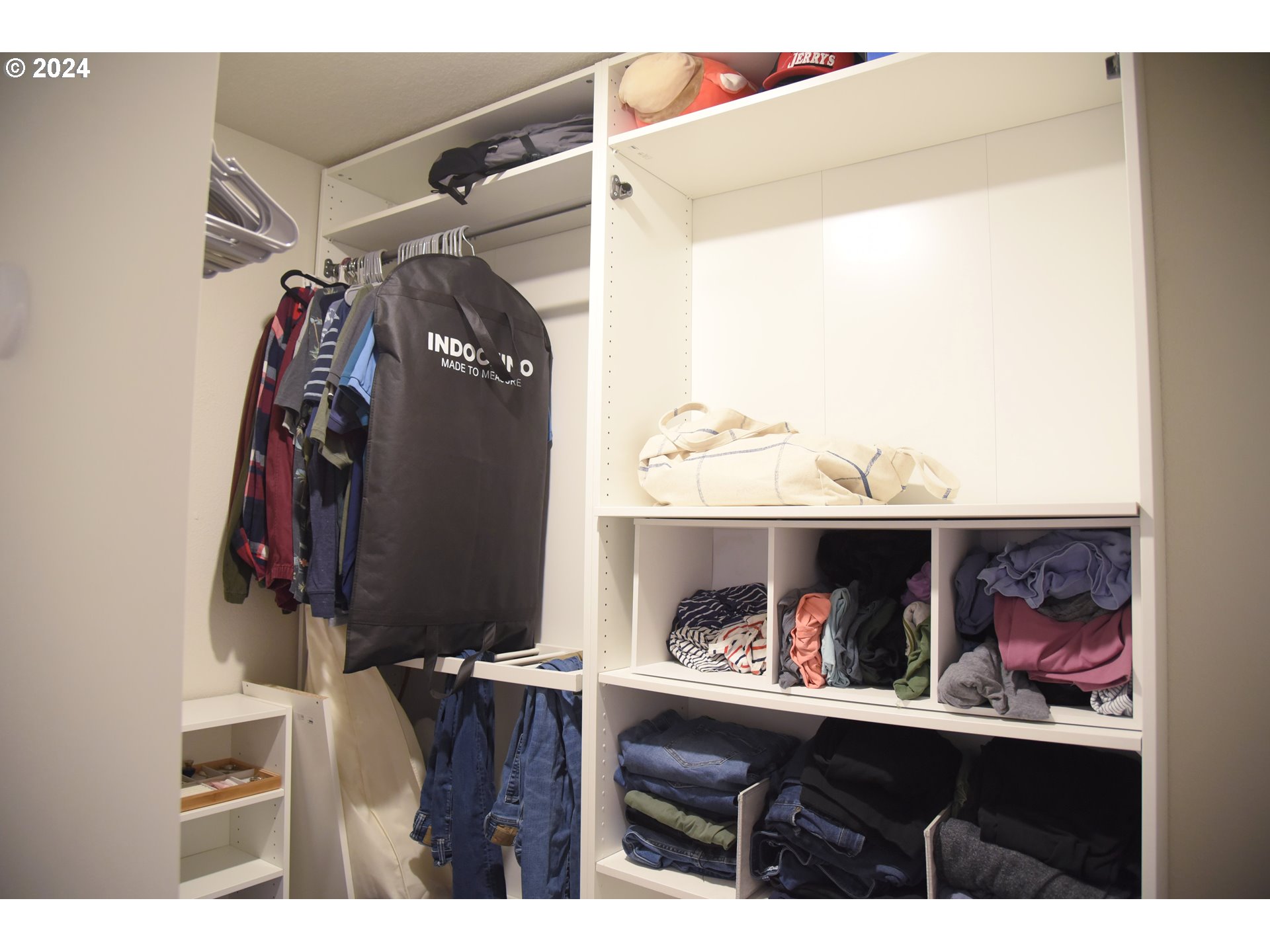 2991 W Street Springfield, OR 97477 - Photo 31 of 43 a view of walk in closet with clothes and shoes