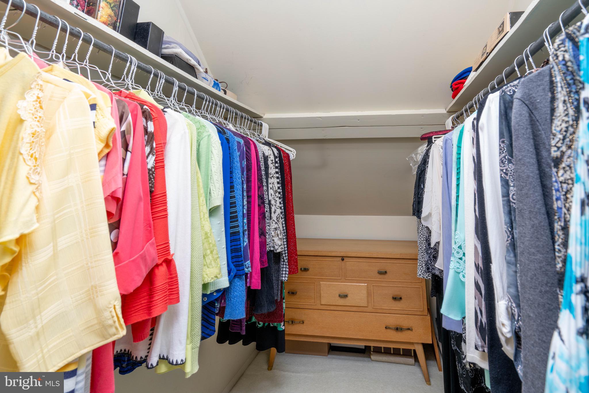 14 Tinder Road Levittown, PA 19056 - Photo 22 of 30 a view of walk in closet with clothes
