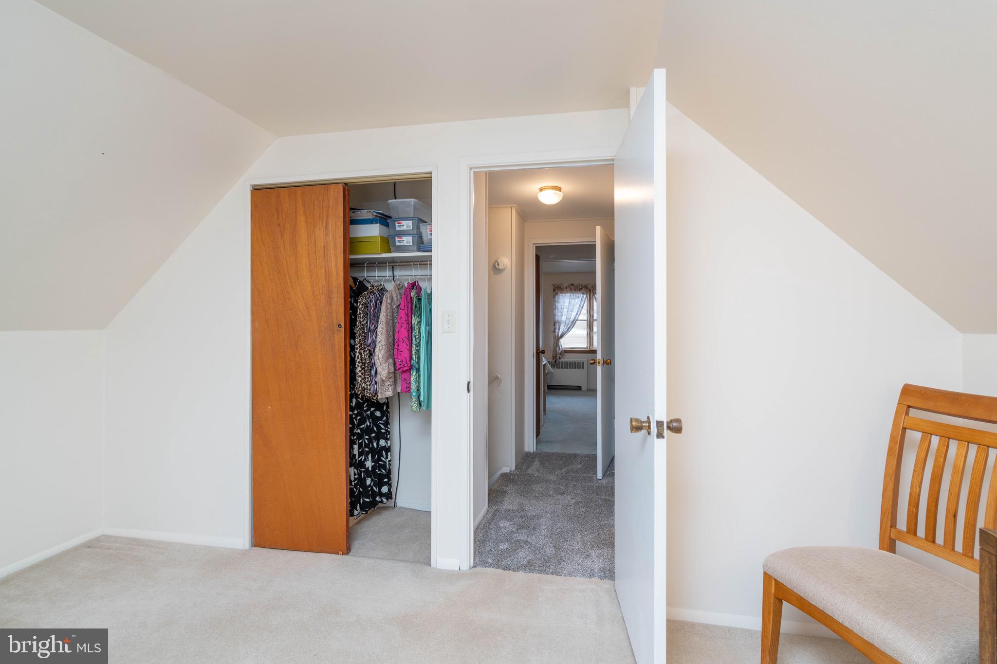 14 Tinder Road Levittown, PA 19056 - Photo 25 of 30 a view of a hallway with wooden shelves