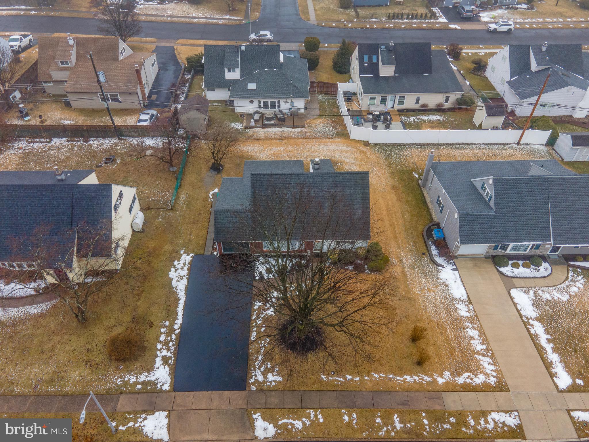 14 Tinder Road Levittown, PA 19056 - Photo 4 of 30 a buildings covered with tall trees