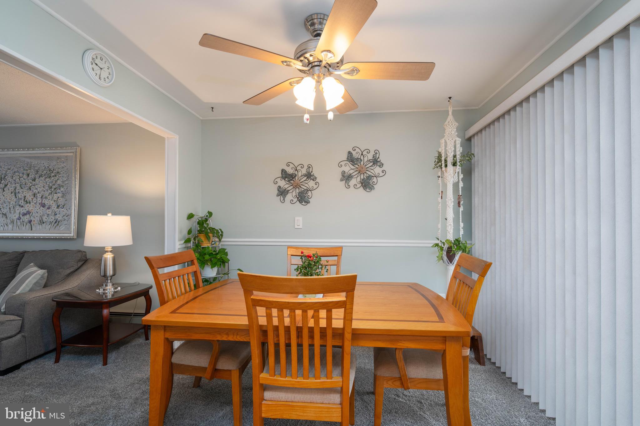 14 Tinder Road Levittown, PA 19056 - Photo 9 of 30 a view of a dining room with furniture and a chandelier