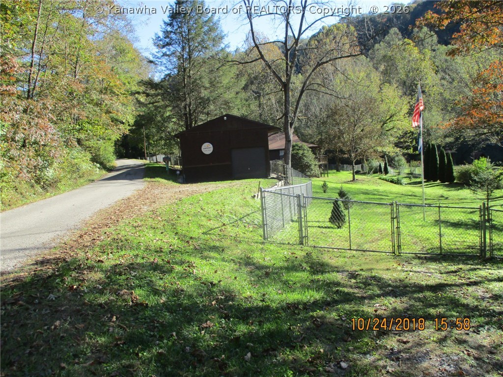 754 Little Italy Road Ivydale, WV 25113 - Photo 2 of 26 View as you come up to the property. Large and tall 2 car garage.