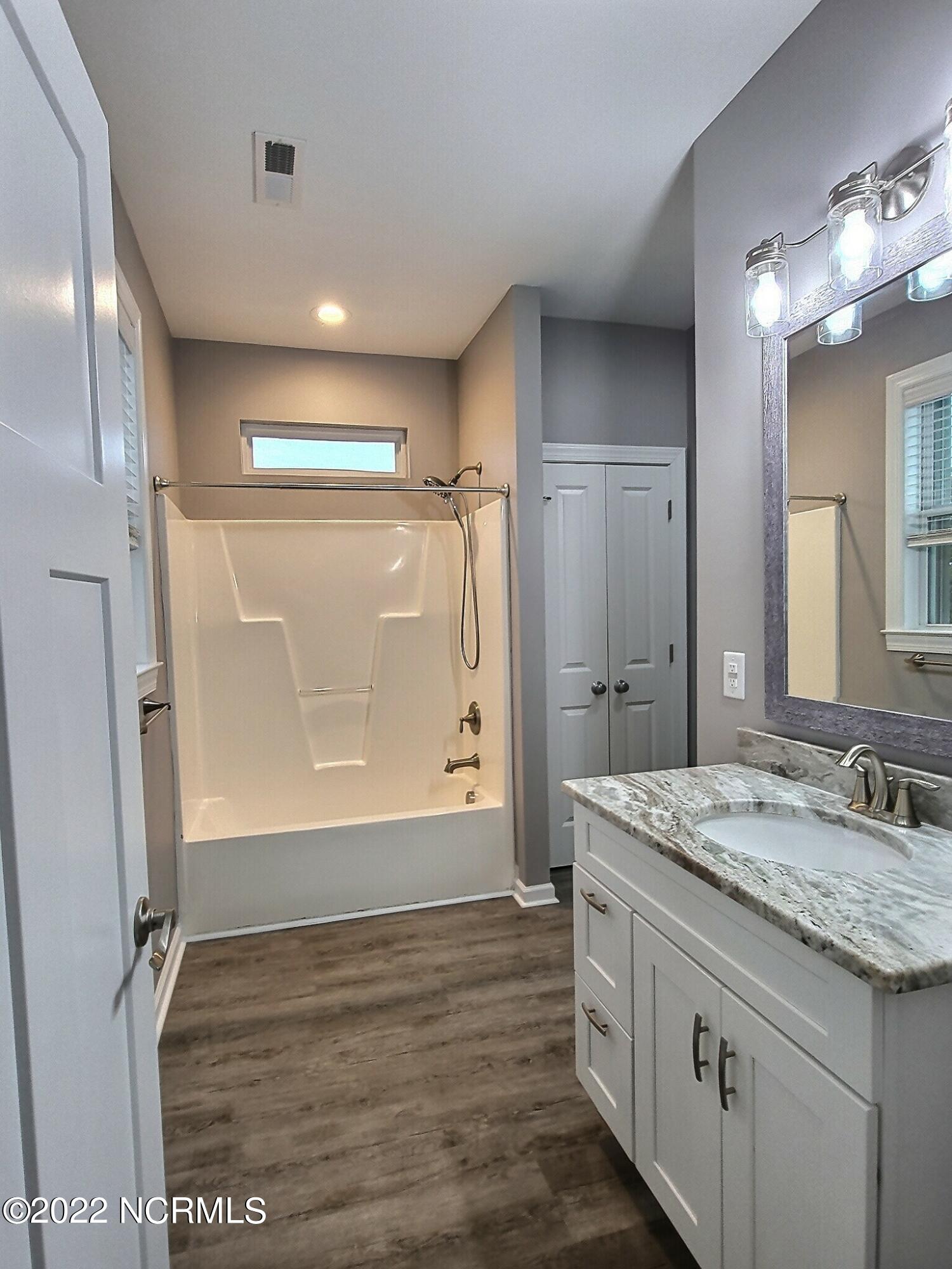 2076 Watts Landing Road Hampstead, NC 28443 - Photo 42 of 51 2nd owners ensuite, vanity with granite tops, linen closet