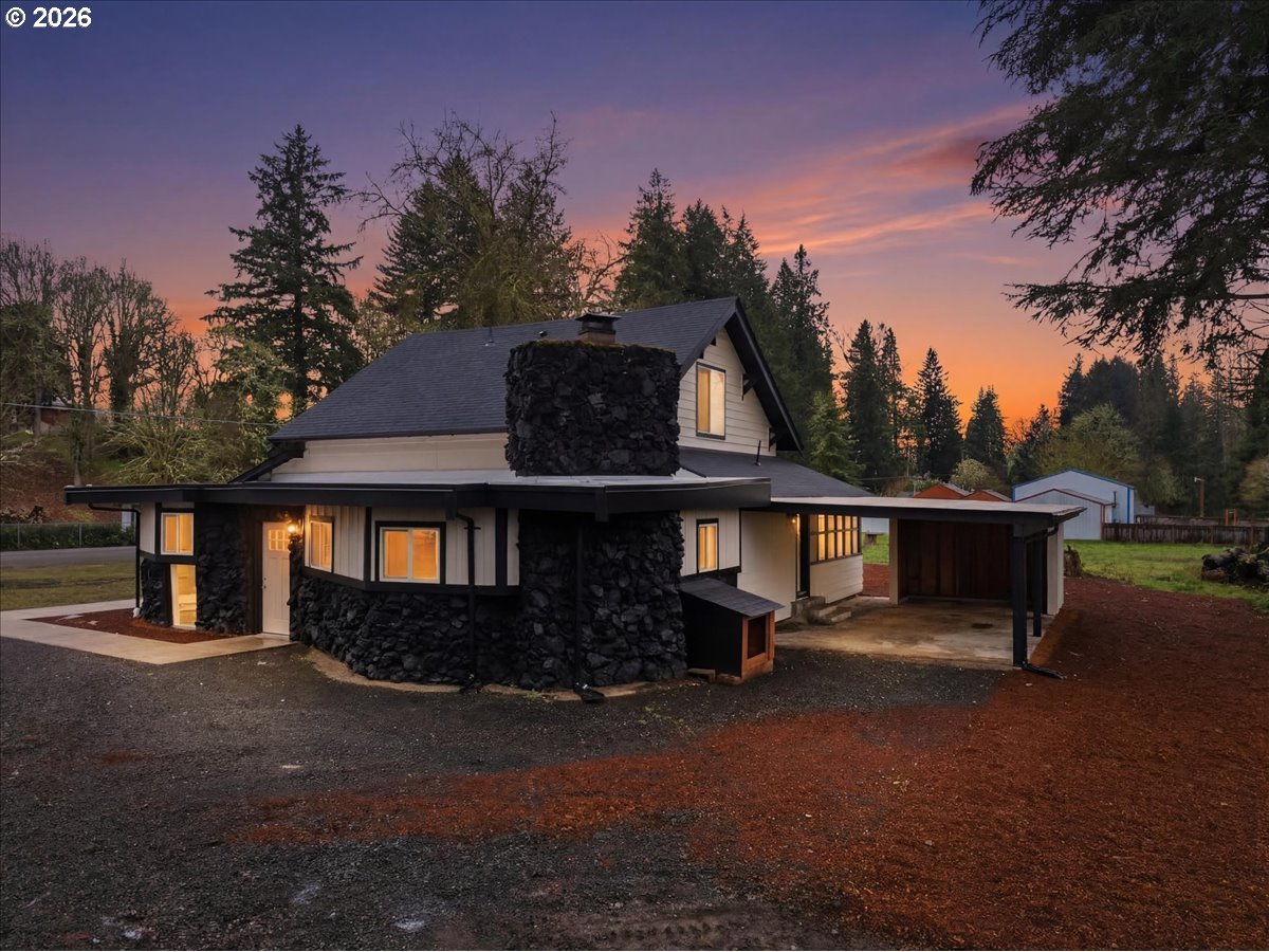 28411 Liberty Road Sweet Home, OR 97386 - Photo 3 of 48 a front view of a house with a yard