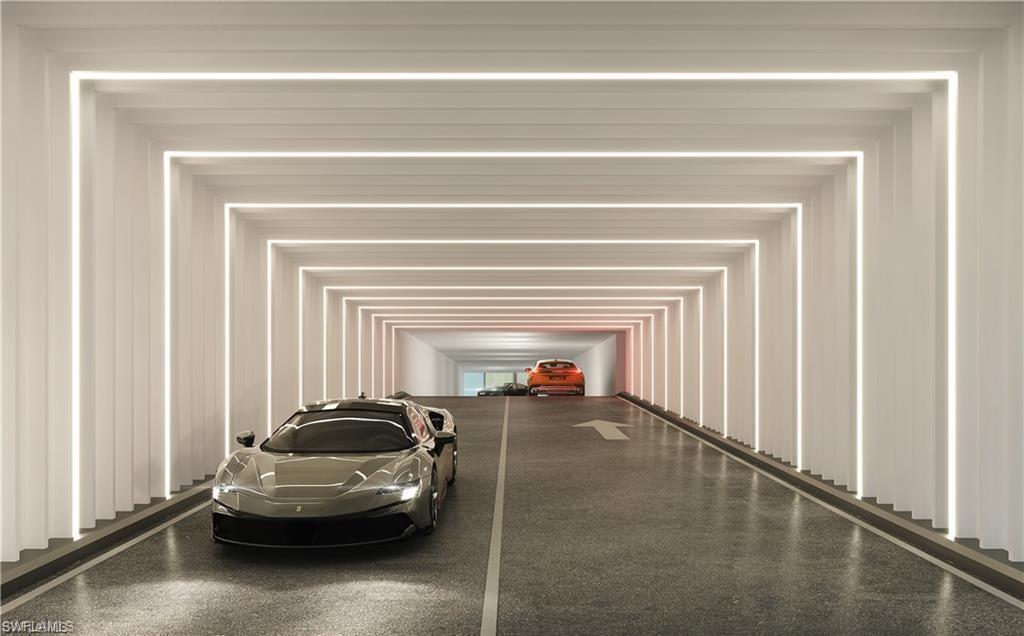 1925 Metropolitan Boulevard, Unit 601 Naples, FL 34104 - Photo 14 of 14 a living room with furniture and a fireplace