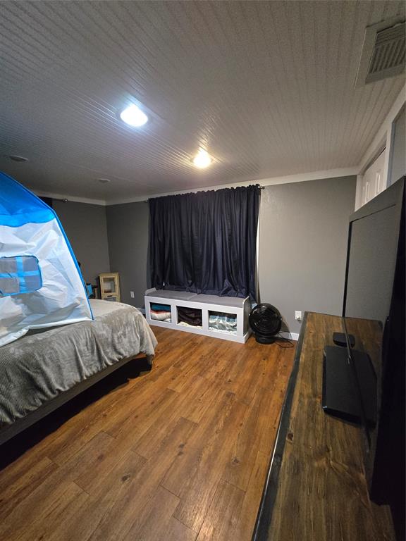 305 South Leon Street Gustine, TX 76455 - Photo 24 of 33 a bed room with a bed and a television