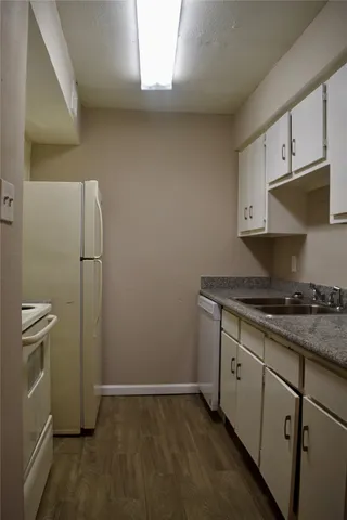 a kitchen with stainless steel appliances a stove and a refrigerator