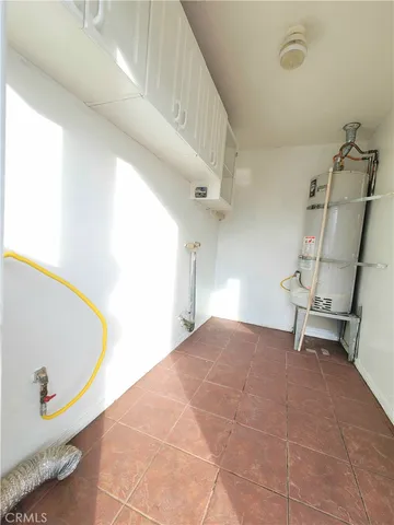 a view of a hallway with a potted plant