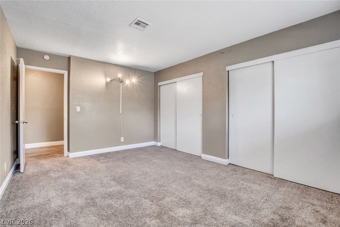 4367 South Mojave Road Las Vegas, NV 89121 - Photo 36 of 53 A well-proportioned bedroom with ample storage and soft carpeting awaits new occupants.