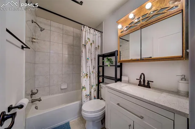 a bathroom with a sink a toilet and a bathtub