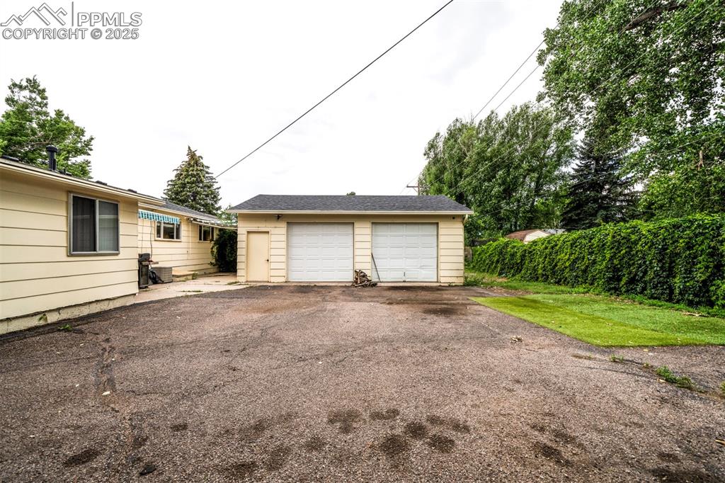 3710 Windflower Circle Colorado Springs, CO 80918 - Photo 30 of 32 a view of a house with a backyard