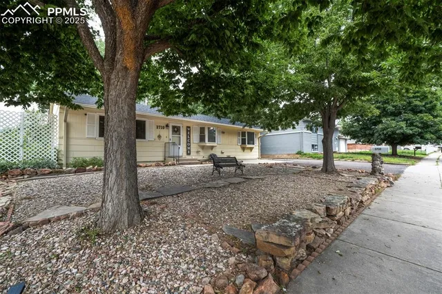 a house view with a backyard space