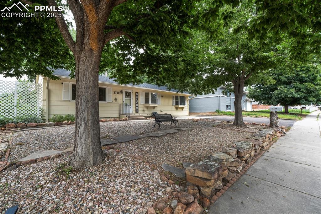3710 Windflower Circle Colorado Springs, CO 80918 - Photo 3 of 32 a house view with a backyard space