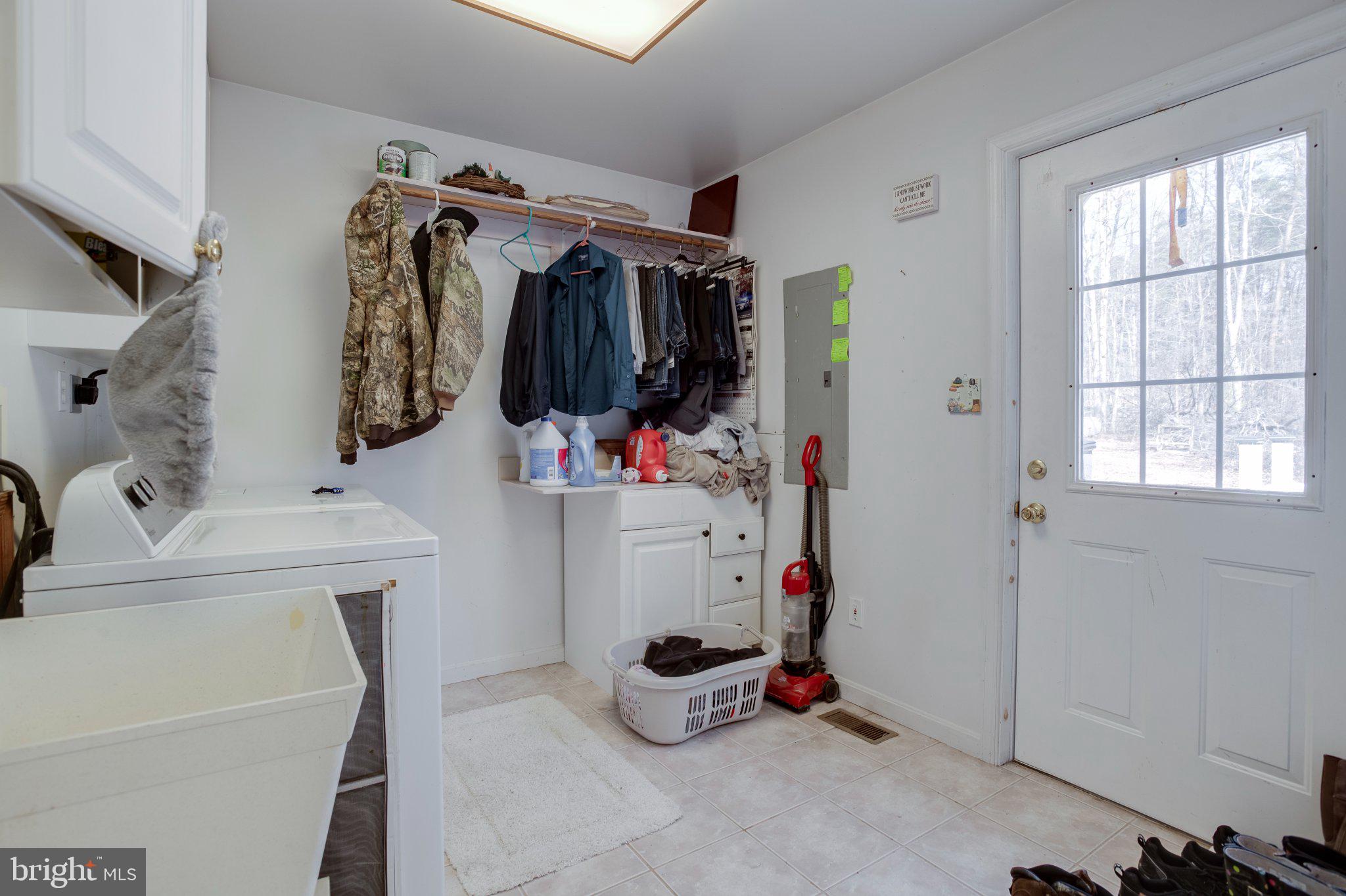 3220 Courtney School Road Midland, VA 22728 - Photo 29 of 111 Functional laundry space with natural light.