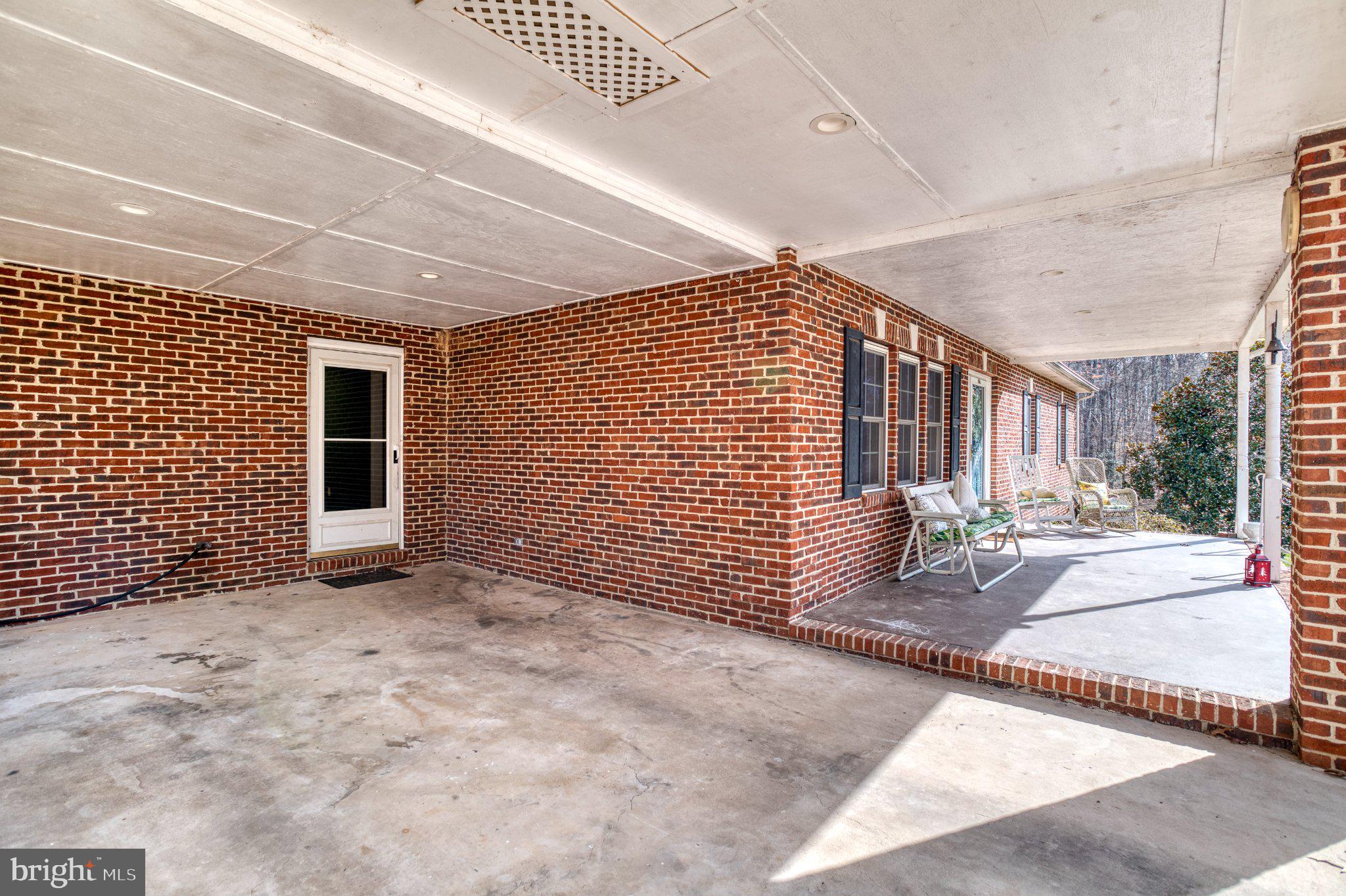 3220 Courtney School Road Midland, VA 22728 - Photo 9 of 111 Spacious brick carport for outdoor living.