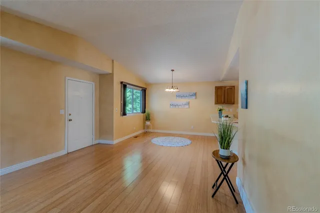 a view of livingroom with furniture and wooden floor