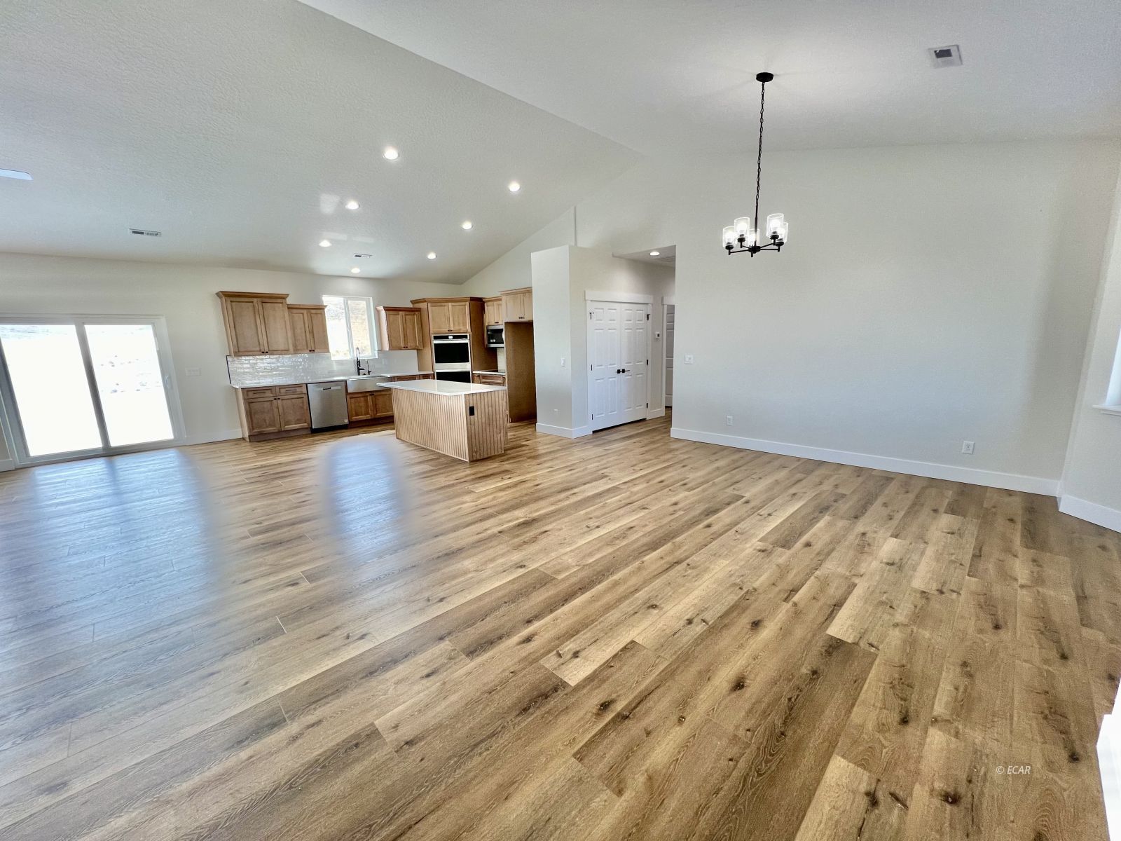 610 Ridgeway Drive Spring Creek, NV 89815 - Photo 12 of 33 a view of empty room with wooden floor