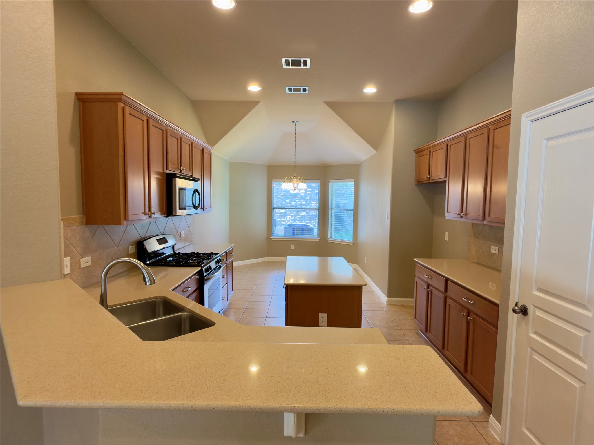 1901 Main Street Cedar Park, TX 78613 - Photo 8 of 27 Large Kitchen w/ Gas Cooking and Center Island