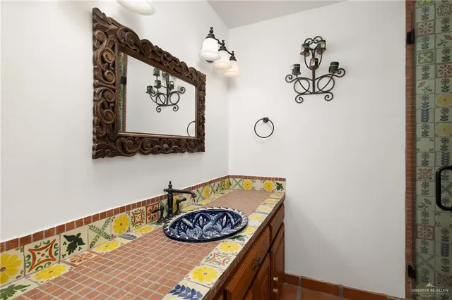 a view of a swimming pool with a table and chairs