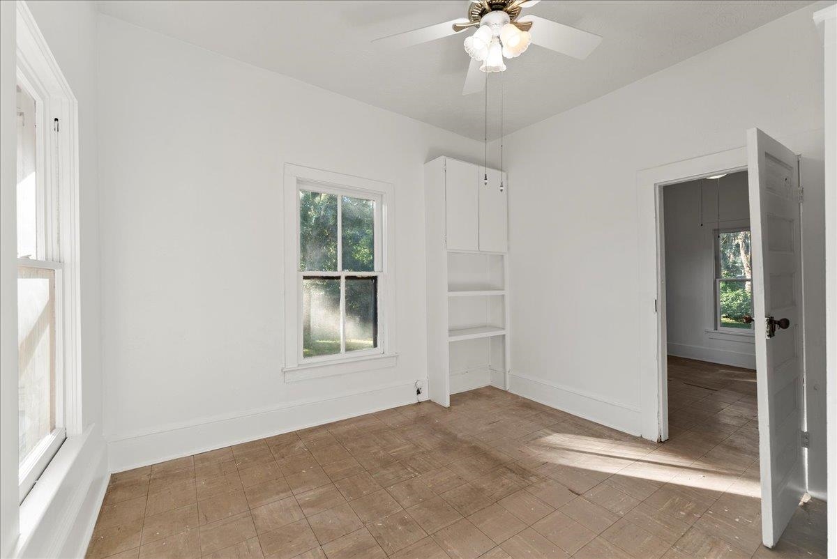 10 Clark Street St. Augustine, FL 32084 - Photo 17 of 44 an empty room with windows and closet area