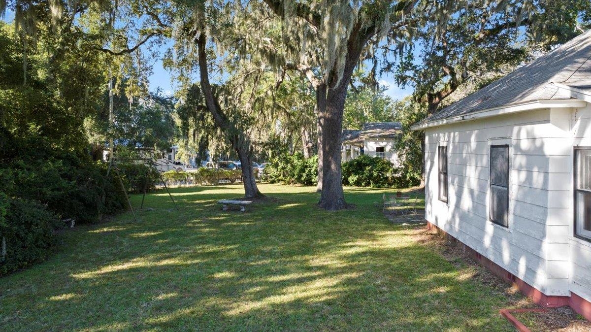 10 Clark Street St. Augustine, FL 32084 - Photo 30 of 44 a view of a trees in a yard with basketball court