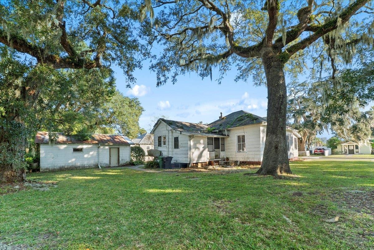 10 Clark Street St. Augustine, FL 32084 - Photo 31 of 44 a view of a house with a yard