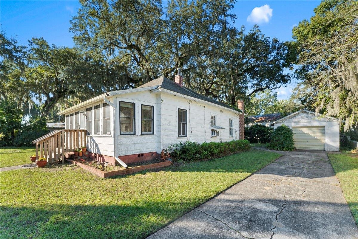10 Clark Street St. Augustine, FL 32084 - Photo 6 of 44 a view of house with backyard and garden