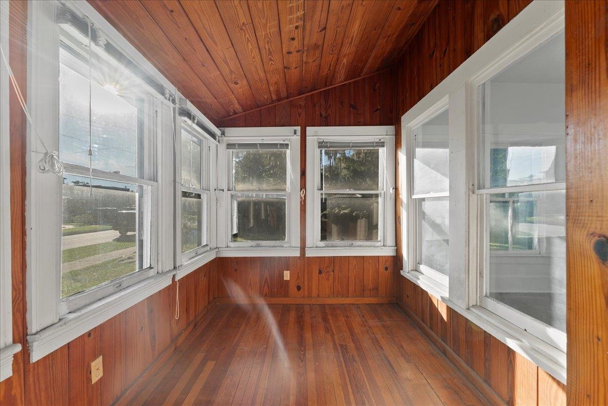 10 Clark Street St. Augustine, FL 32084 - Photo 9 of 44 a view of empty room with wooden floor and fan