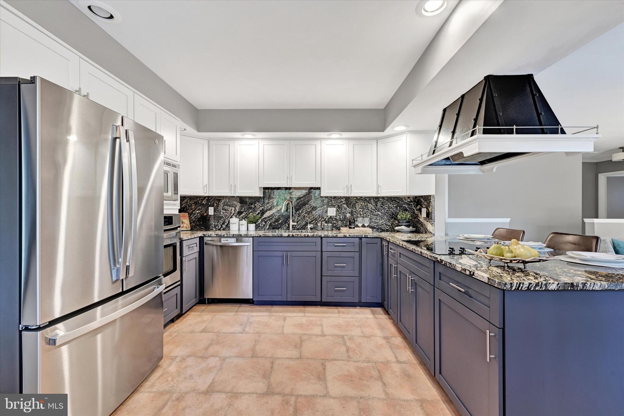 6 Drew Court Baldwin, MD 21013 - Photo 13 of 39 a kitchen with stainless steel appliances granite countertop a refrigerator a stove and a sink
