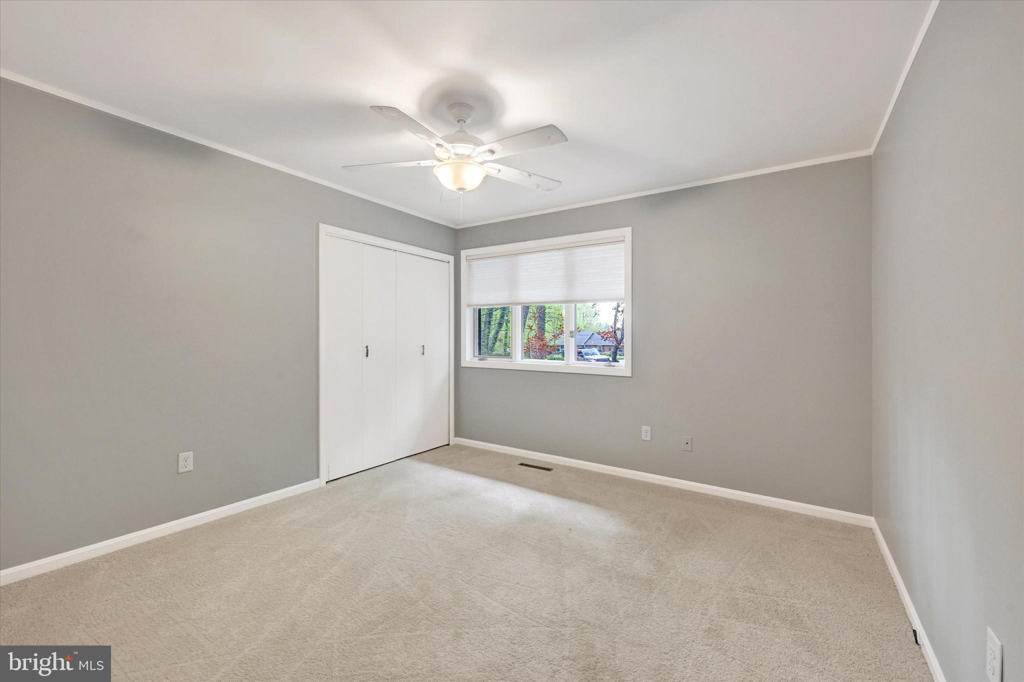 6 Drew Court Baldwin, MD 21013 - Photo 17 of 39 an empty room with windows and fan
