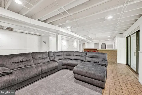 a living room with furniture and a couch
