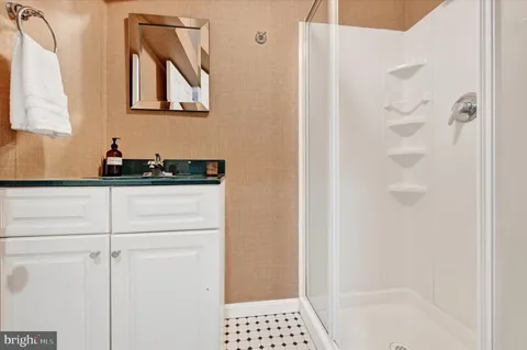 a view of backyard with large trees