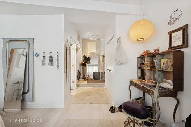 a view of a livingroom with furniture and front door