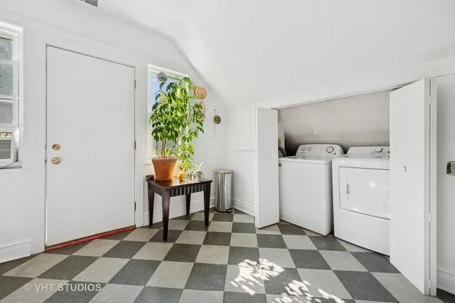 a view of a storage & utility room with a sink