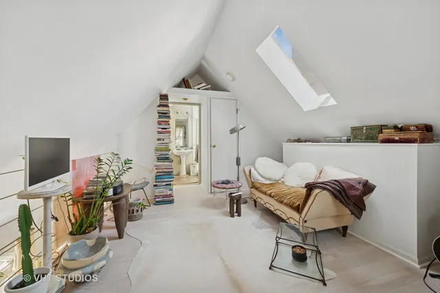 a room with furniture and a flat screen tv