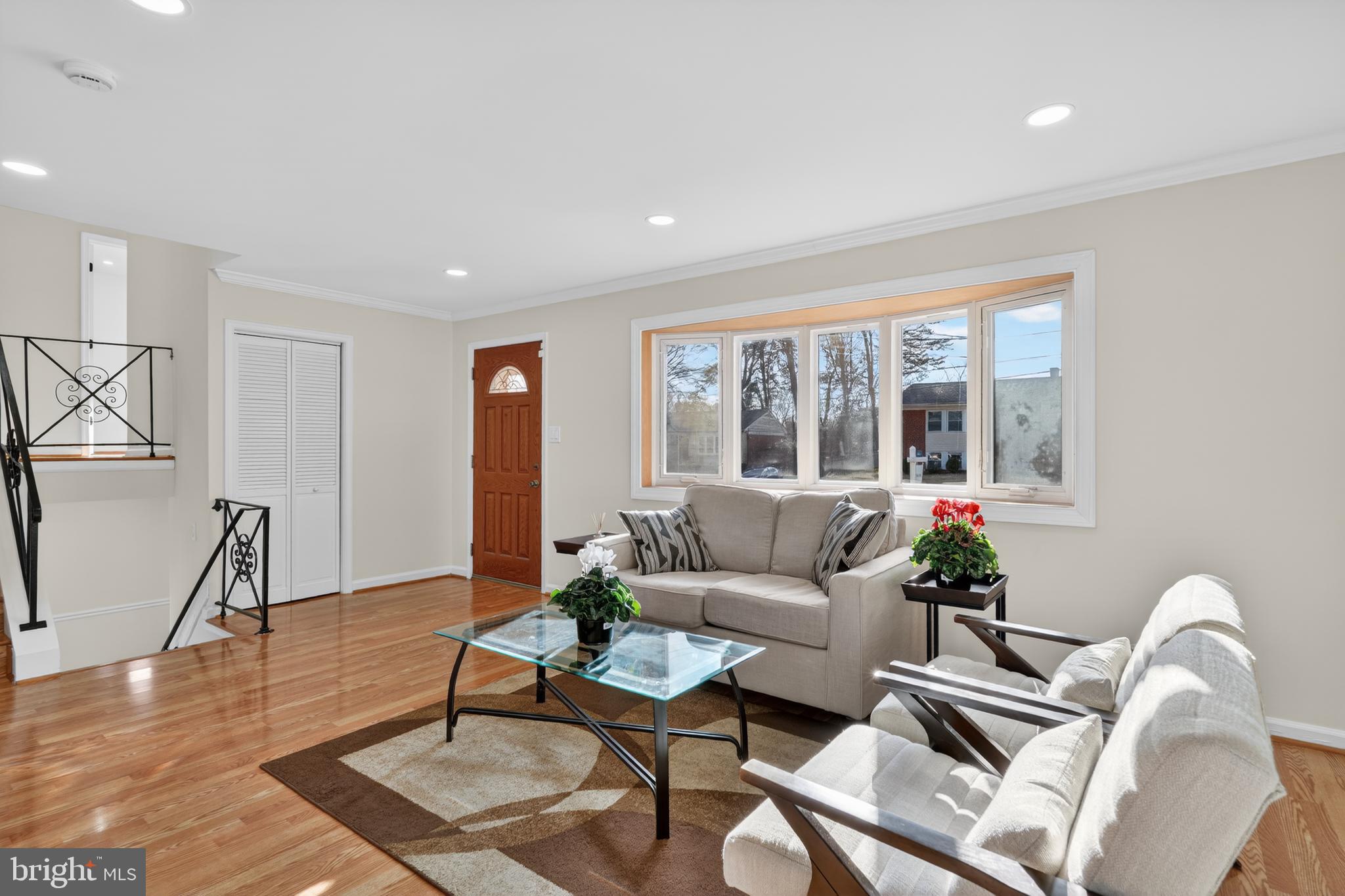 1132 Loxford Terrace Silver Spring, MD 20901 - Photo 2 of 30 a living room with furniture and a window
