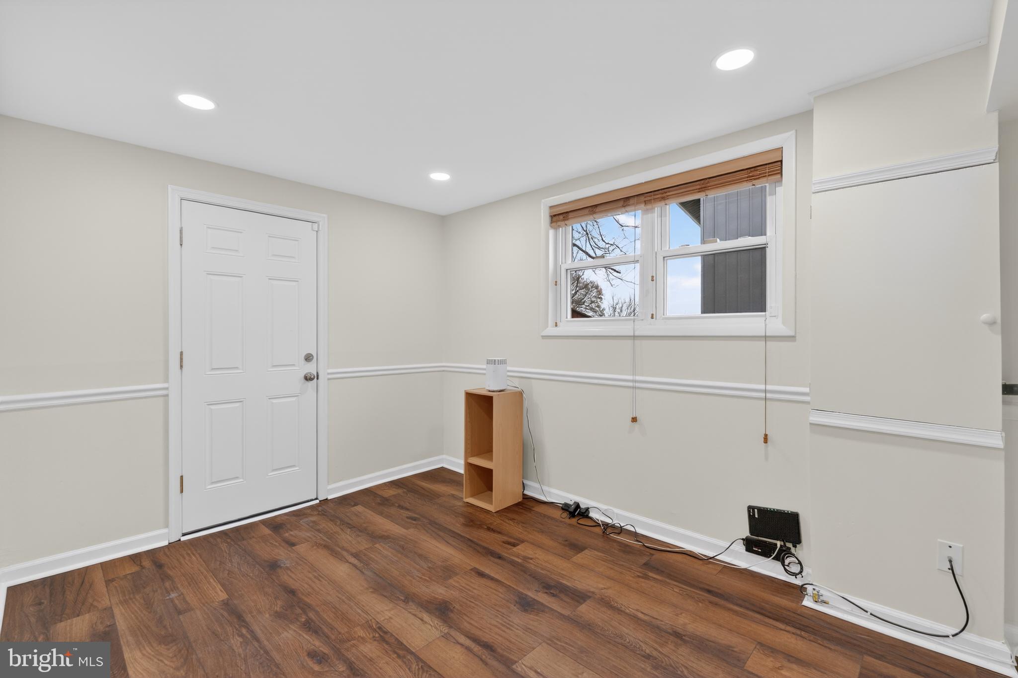 1132 Loxford Terrace Silver Spring, MD 20901 - Photo 22 of 30 a view of a livingroom with wooden floor