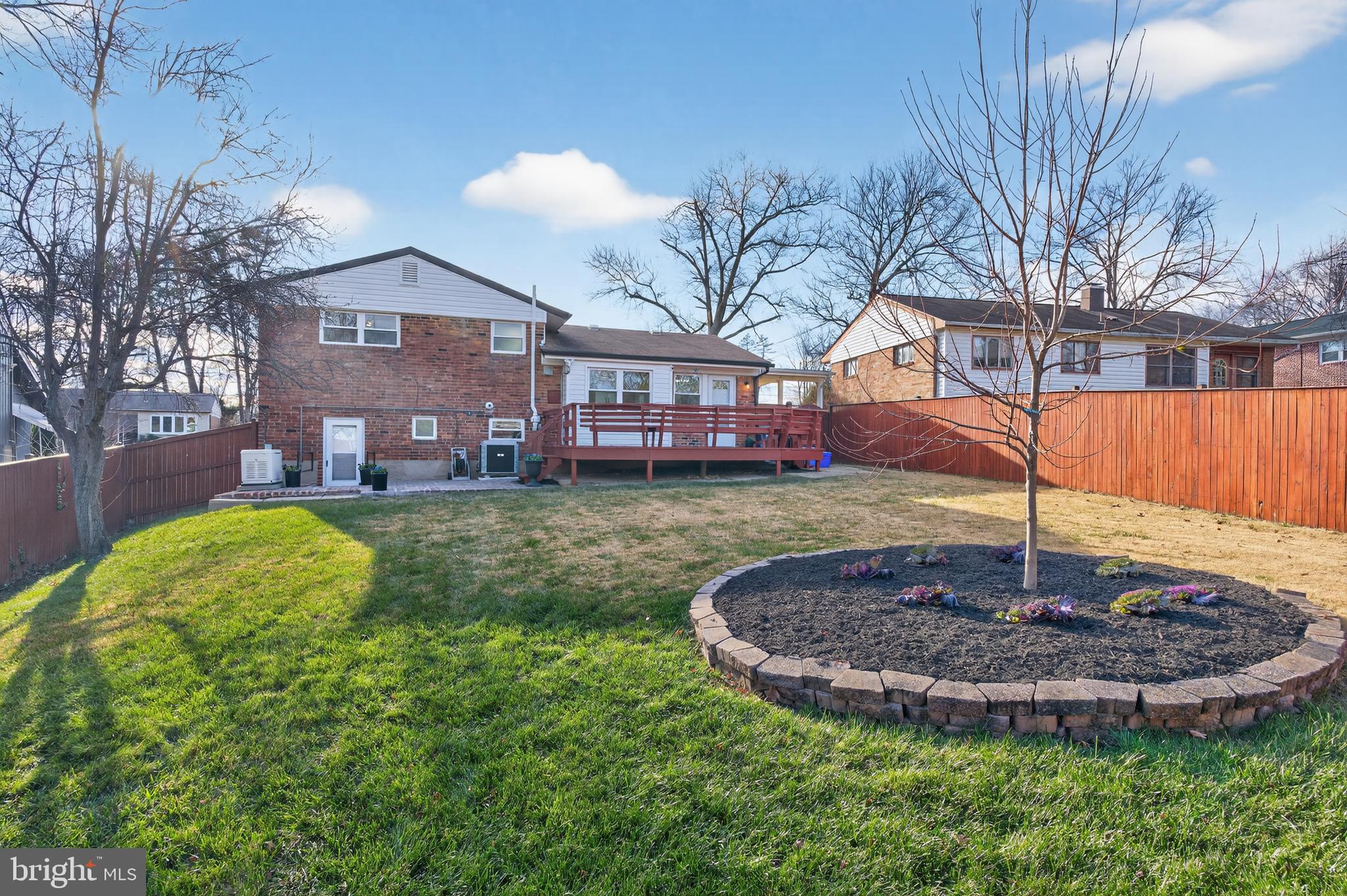 1132 Loxford Terrace Silver Spring, MD 20901 - Photo 26 of 30 a view of a house with a backyard porch and sitting area