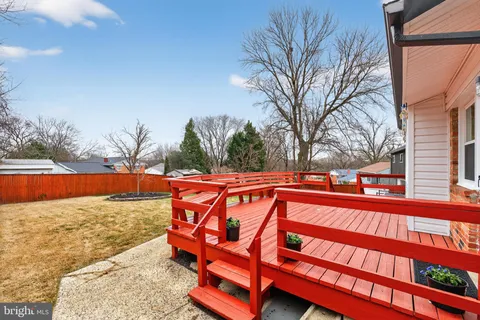 a view of swimming pool with an outdoor seating