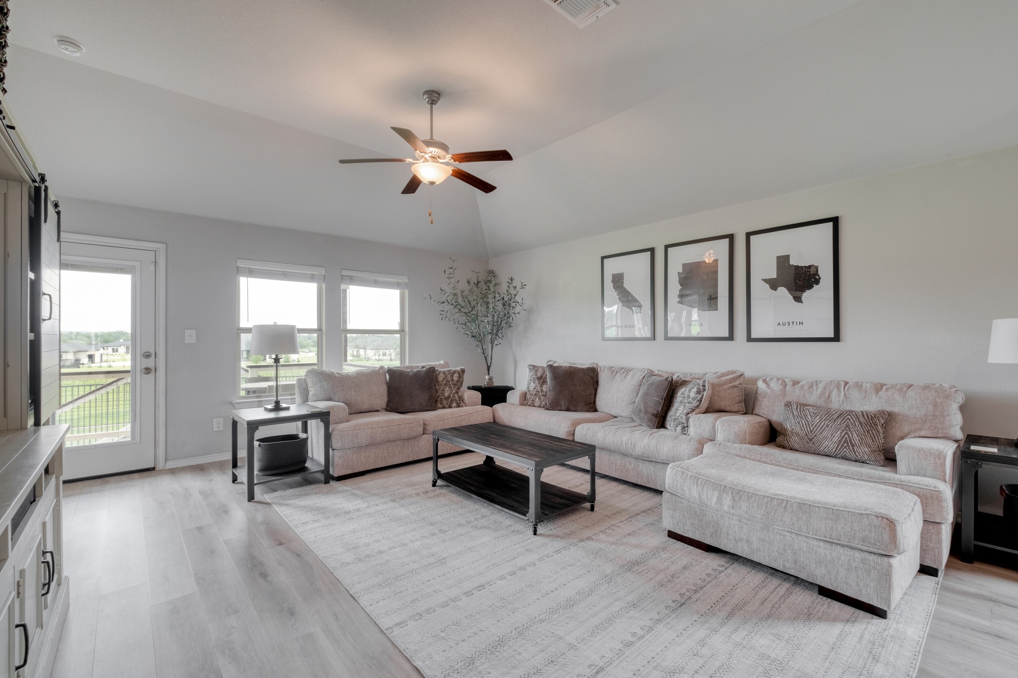 1000 Bright Star Cove Georgetown, TX 78628 - Photo 15 of 40 a living room with furniture and a large window