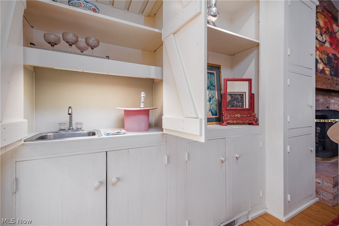 3151 Perry Drive Northwest Canton, OH 44708 - Photo 10 of 49 Kitchen featuring open shelves and light wood finished floors
