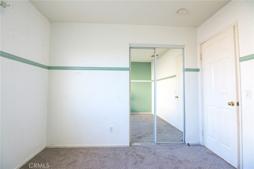 15036 Carrolton Street Adelanto, CA 92301 - Photo 14 of 23 a view of an empty room