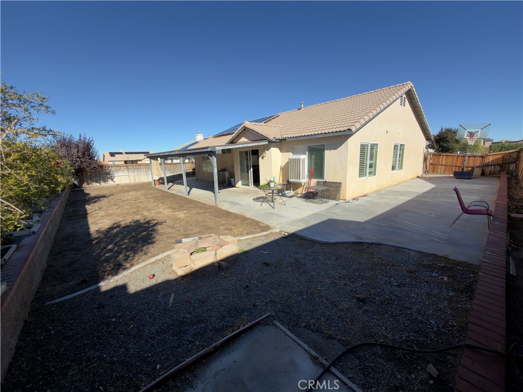15036 Carrolton Street Adelanto, CA 92301 - Photo 23 of 23 a view of house with outdoor space