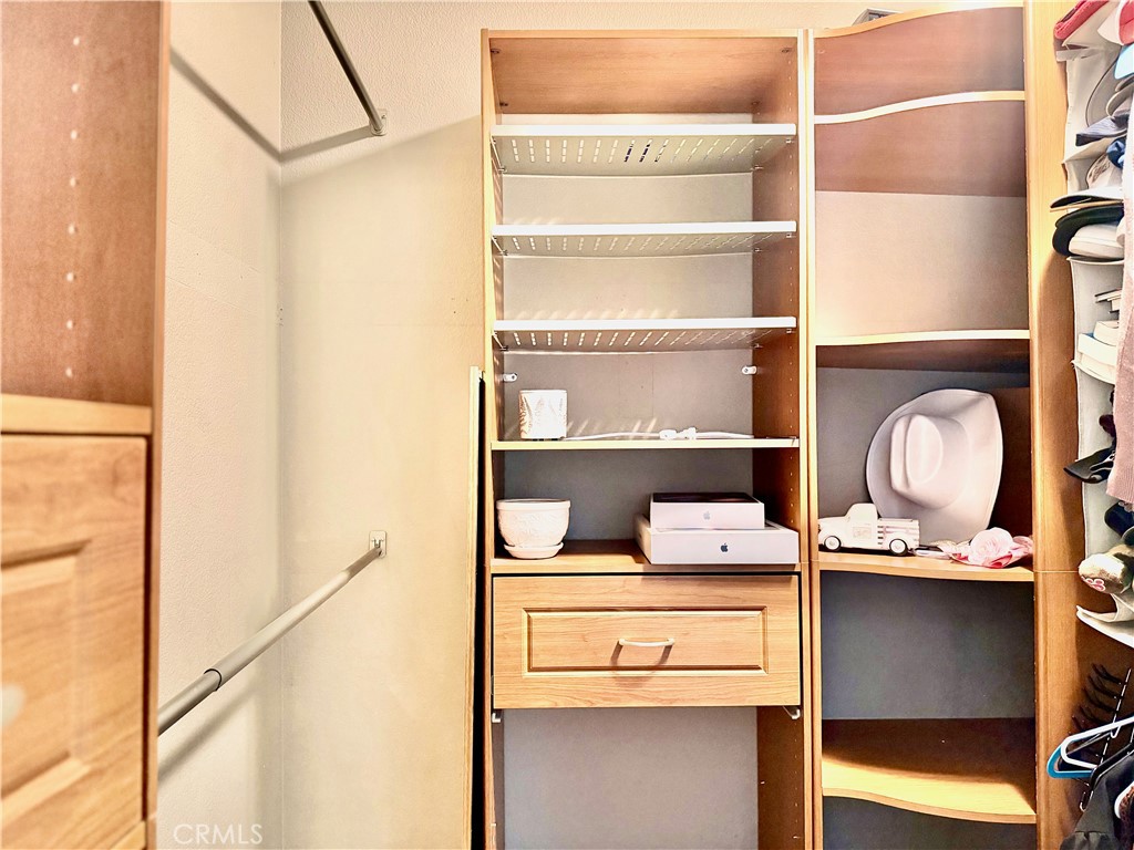 15036 Carrolton Street Adelanto, CA 92301 - Photo 10 of 23 a room with storage and utility