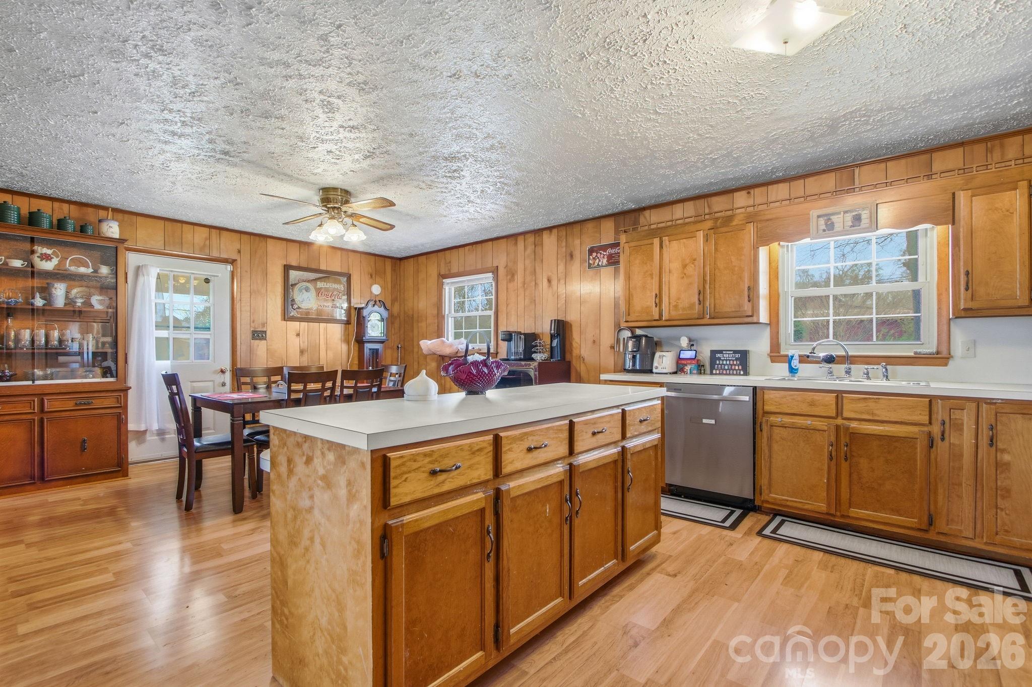 3266 Coble Dairy Road Hudson, NC 28638 - Photo 11 of 37 a kitchen with sink cabinets and wooden floor