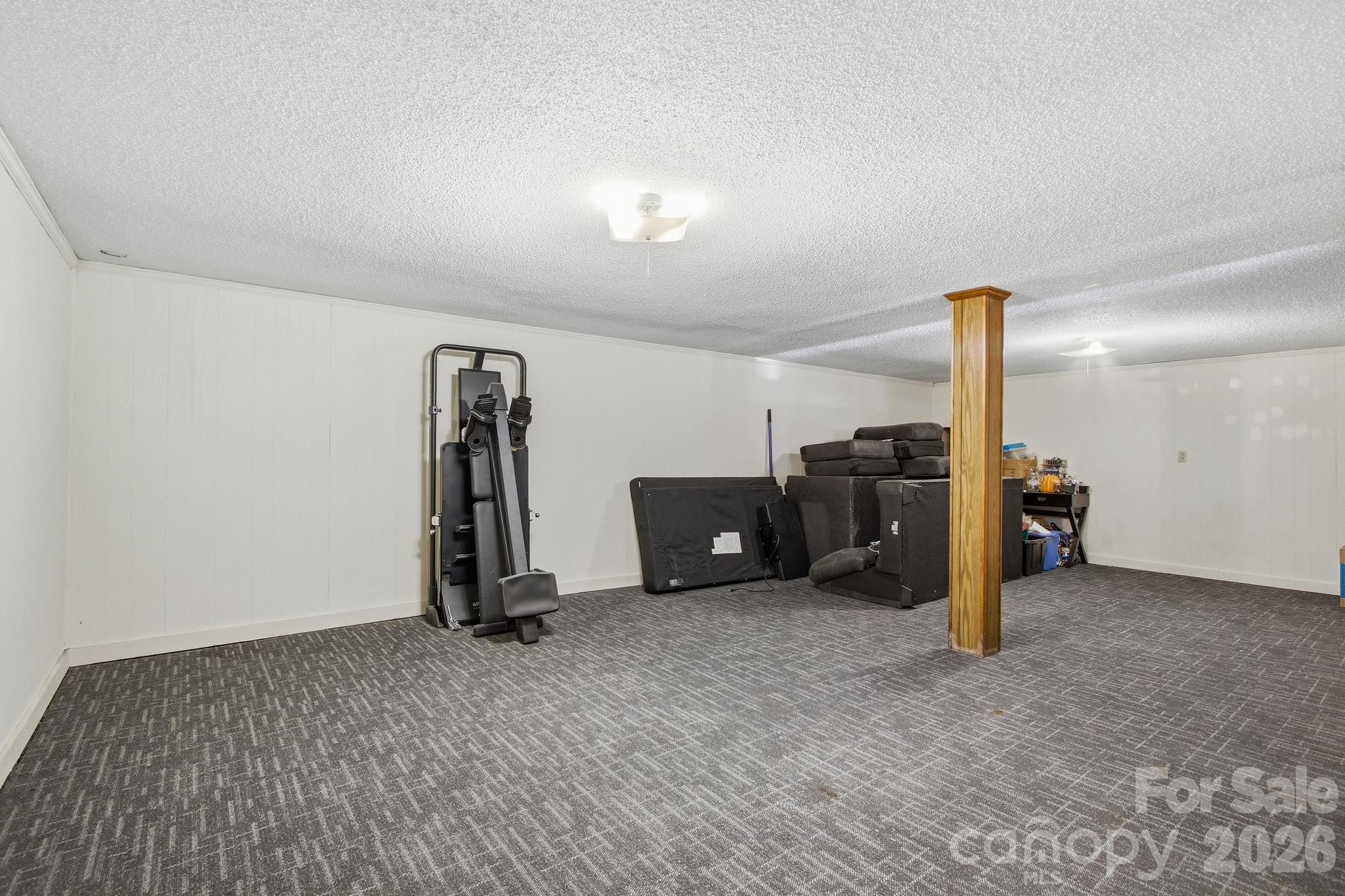 3266 Coble Dairy Road Hudson, NC 28638 - Photo 26 of 37 a view of a room with gym equipment