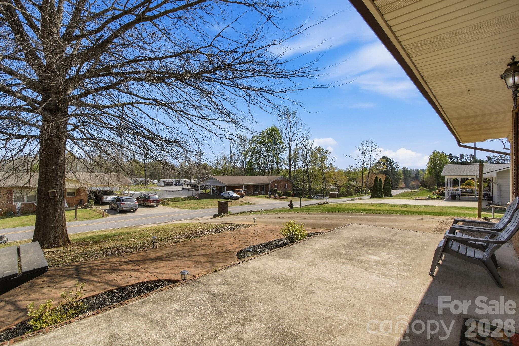 3266 Coble Dairy Road Hudson, NC 28638 - Photo 32 of 37 a view of yard with swimming pool and sitting area