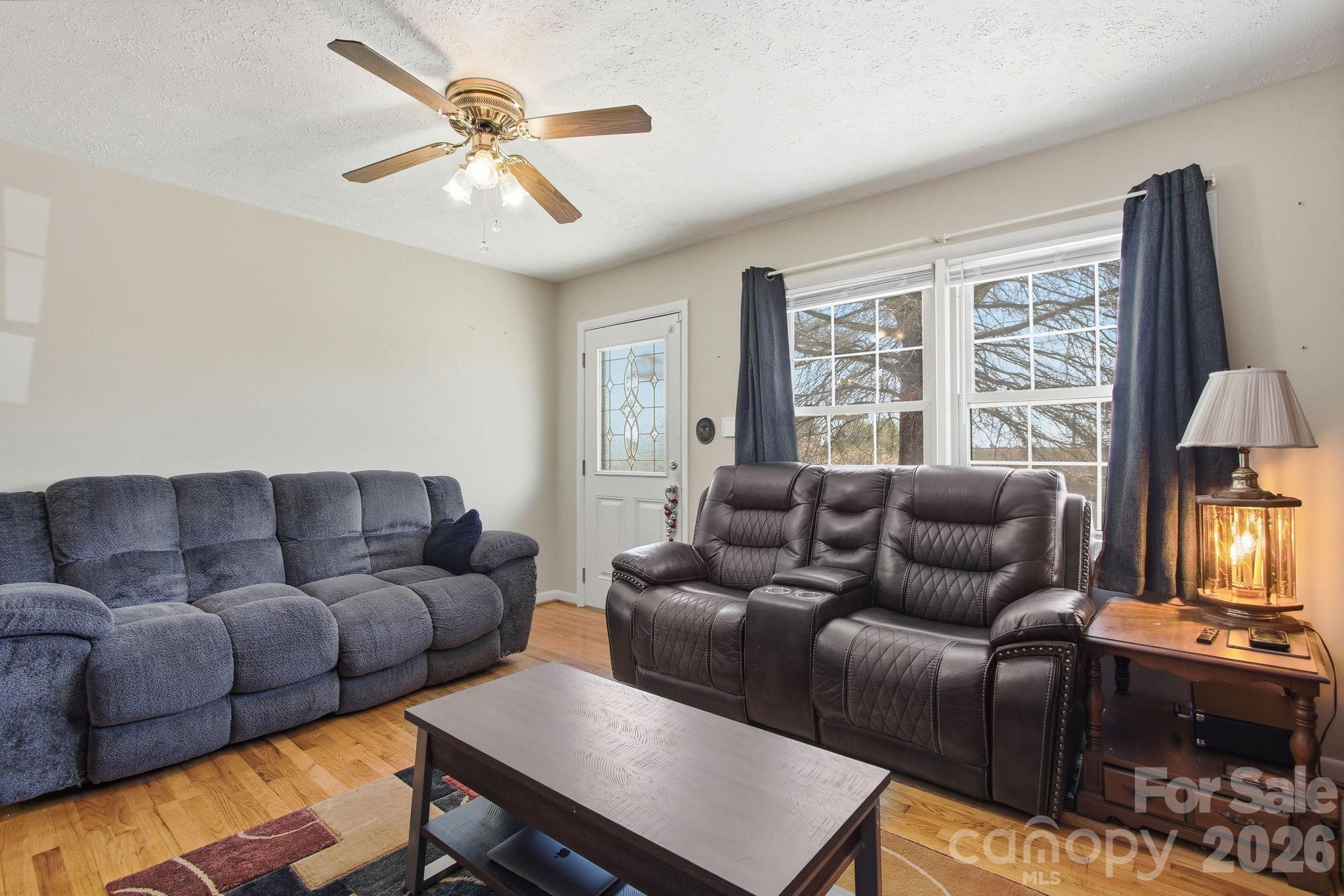 3266 Coble Dairy Road Hudson, NC 28638 - Photo 6 of 37 a living room with furniture and a window